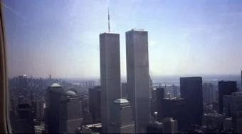 Lower Manhattan and the World Trade Center twin
                        towers seen across the Hudson River from a
                        light aircraft.
